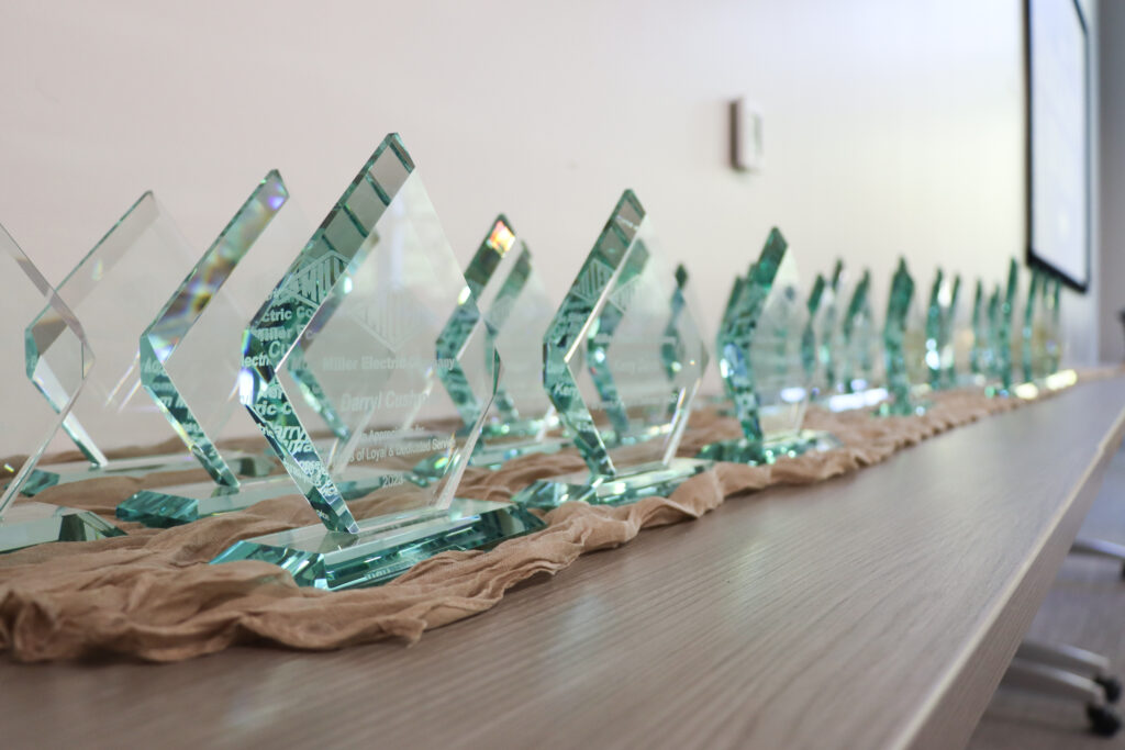 Diamond shaped longevity awards on a table.