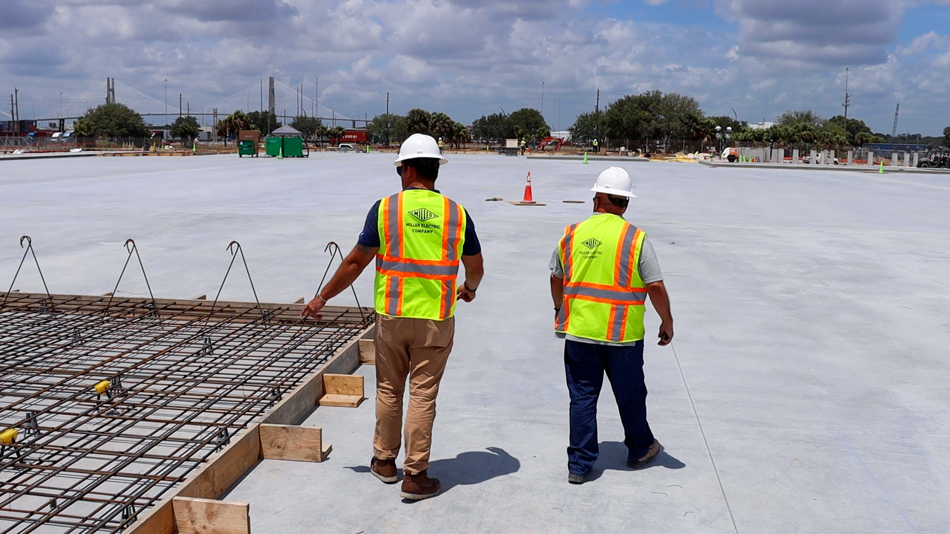 Miller Electric workers on the roof of a Toyota building.