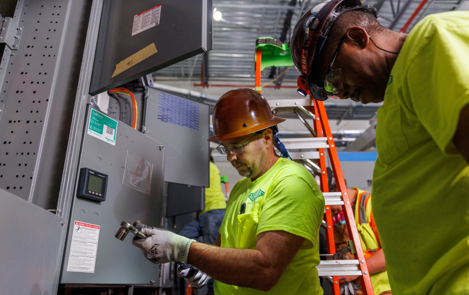 Miller electric electricans working on a job site