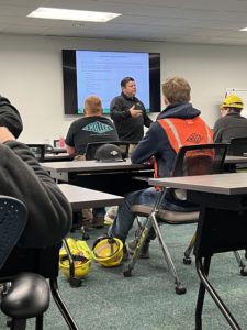 New electricians learning in a classroom