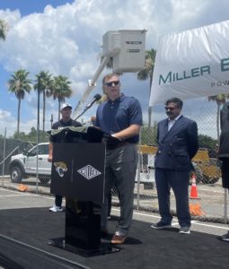 Miller Electric CEO Henry Brown speaking at a podium